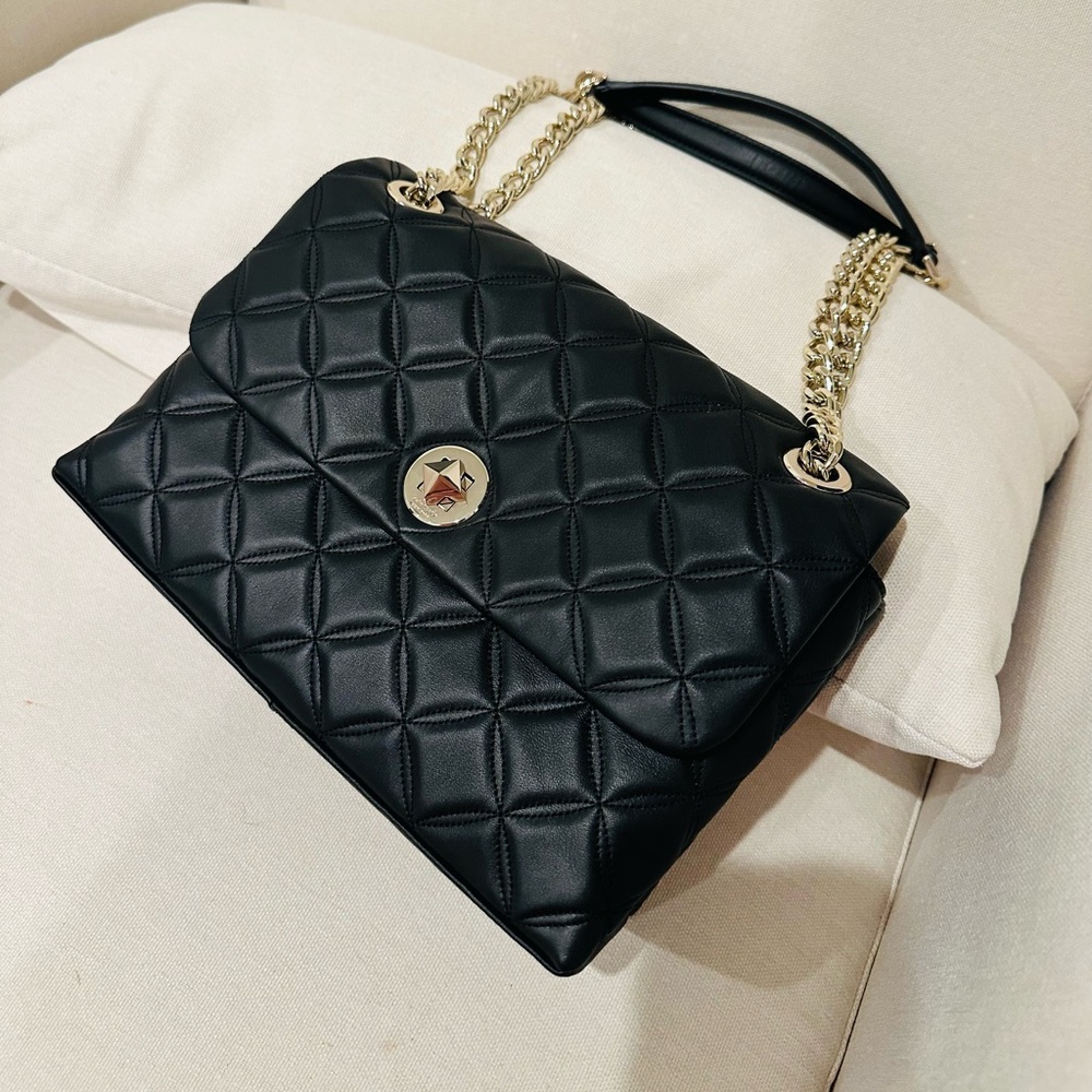 Brand new Kate spade bag, I have plenty of black bags, haven’t used this at all.